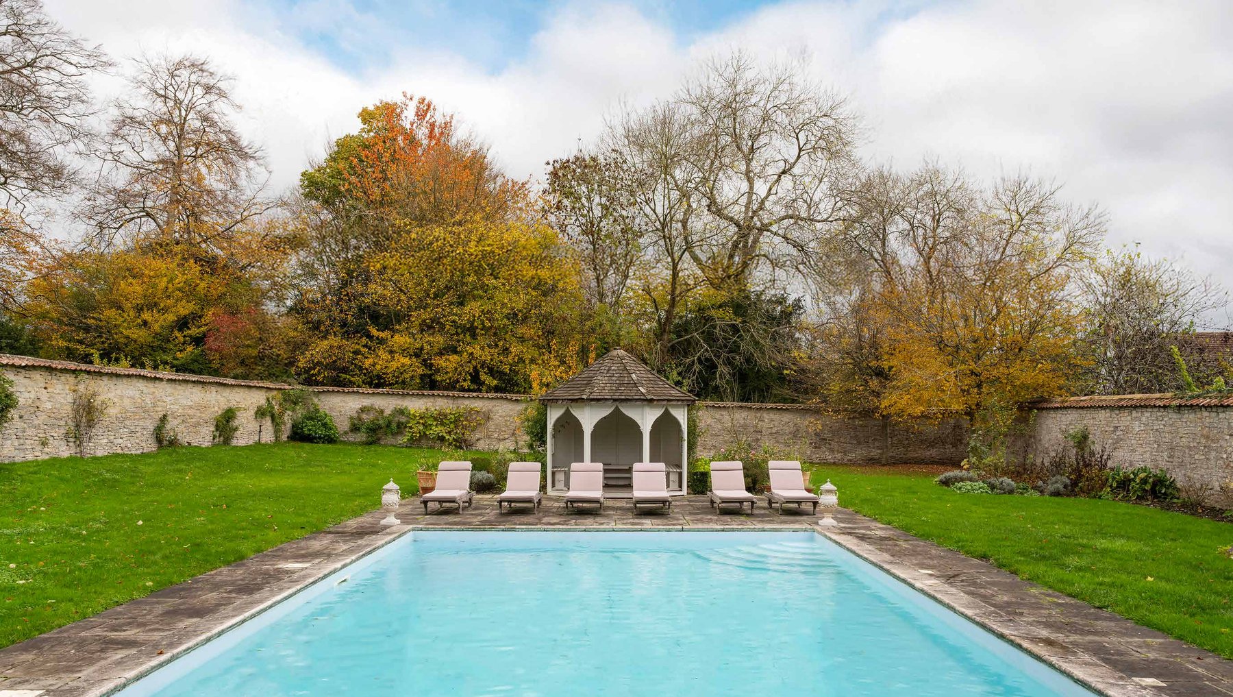 The heated pool and walled garden